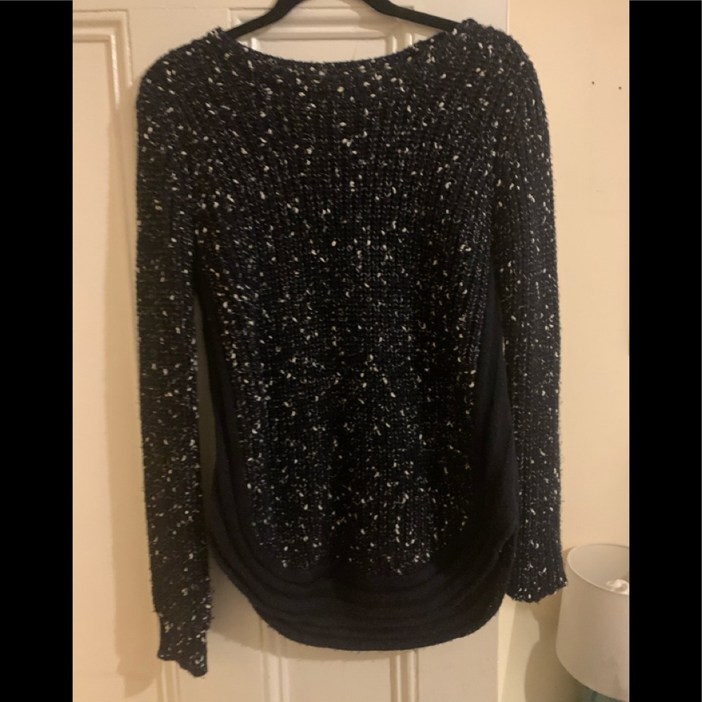 White and navy blue speckled sweater
